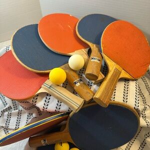 Vintage classic Table Tennis paddles red and blue set of 8 and ping pong balls.
